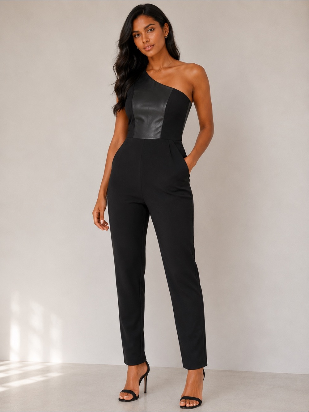 BCBGeneration One-Shoulder Black Jumpsuit with Leatherette Panel
